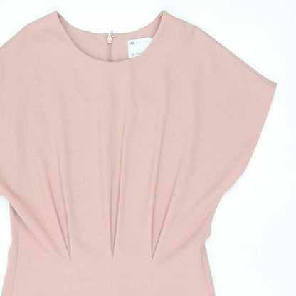 Close-up detail of ASOS women’s pink polyester shift, size UK 12, boat neck zip