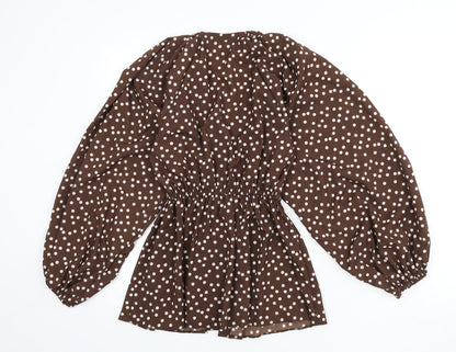 Back view of ASOS women’s brown polka dot polyester basic blouse, size UK 4, v-neck - balloon sleeves