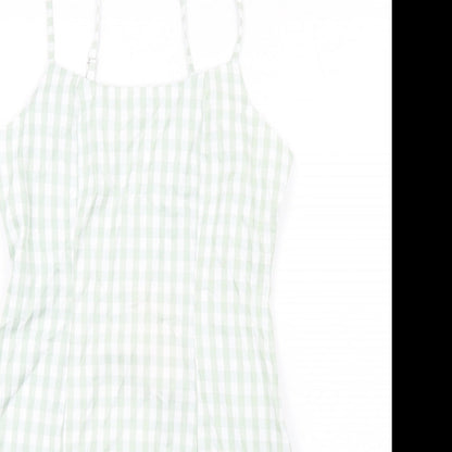 Close-up detail of Missguided women’s green check cotton mini, size UK 8, square neck zip