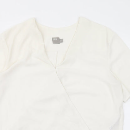 Close-up detail of ASOS women’s ivory polyester basic blouse, size UK 14, v-neck
