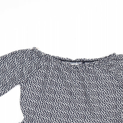 Close-up detail of Next girls’ blue floral polyester basic blouse, size 10, years off the shoulder pullover