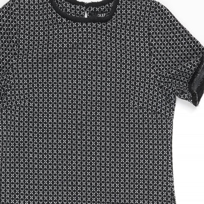 Close-up detail of Miss Selfridge women’s black geometric polyester shift, size UK 12, round neck button