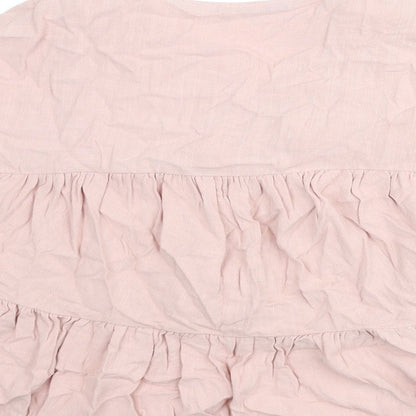 Brand and care label for ASOS women’s pink polyester basic blouse, size UK 6, v-neck - smocked