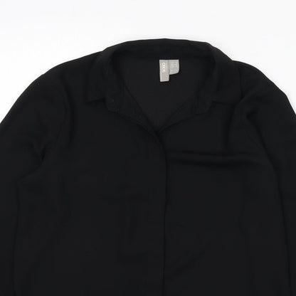 Close-up detail of ASOS women’s black polyester basic button-up, size UK 8, collared