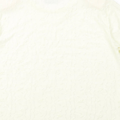 Brand and care label for Canda women’s ivory polyester basic t-shirt, size L, round neck