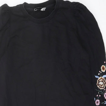Close-up detail of ASOS women’s black polyester a-line, size UK 8, crew neck pullover