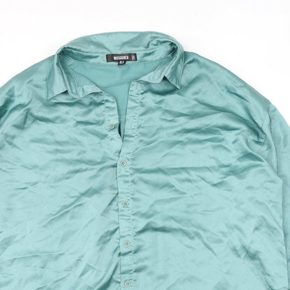 Close-up detail of Missguided women’s green polyester basic button-up, size UK 10, collared