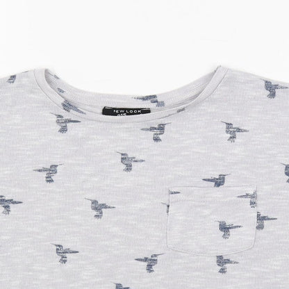 Close-up detail of New Look girls’ grey geometric polyester pullover t-shirt, years crew neck pullover - bird print