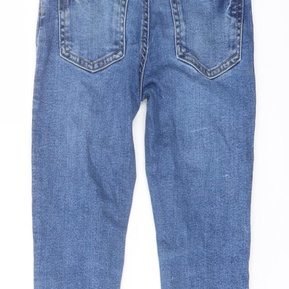 Brand and care label for Denim & Co. girls’ blue polyester skinny jeans, size 6-7, years regular button