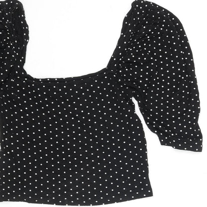 Brand and care label for Missguided women’s black polka dot viscose cropped blouse, size UK 8, square neck