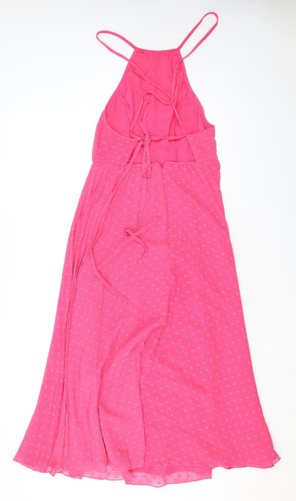 Back view of ASOS women’s pink polka dot polyester a-line, size UK 10, halter zip - open back