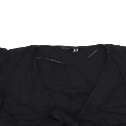 Close-up detail of Vera Moda women’s black viscose cropped tank, size UK 24, v-neck