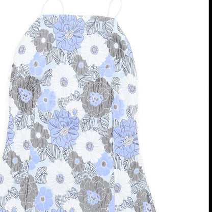 Close-up detail of Missguided women’s blue floral polyester mini, size UK 10, square neck zip