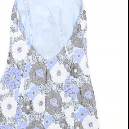 Brand and care label for Missguided women’s blue floral polyester mini, size UK 10, square neck zip
