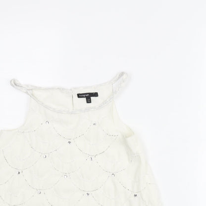 Close-up detail of Autograph girls’ white geometric polyester camisole blouse, size 7-8, years round neck button - beading