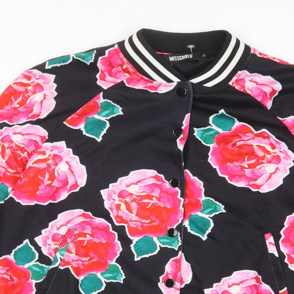 Close-up detail of Missguided women’s multicoloured floral jacket, size UK 8, button - pockets