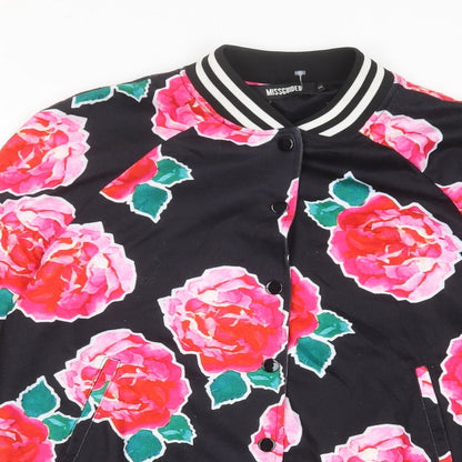 Close-up detail of Missguided women’s multicoloured floral jacket, size UK 8, button - pockets