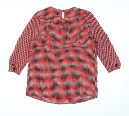 Back view of Dunnes women’s red geometric polyester basic blouse, size XS, round neck