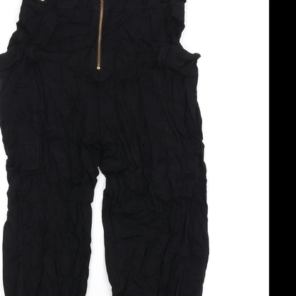 Close-up detail of French Connection women’s black viscose trousers, size UK 6, 29-inch leg regular zip