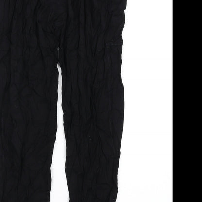 Brand and care label for French Connection women’s black viscose trousers, size UK 6, 29-inch leg regular zip