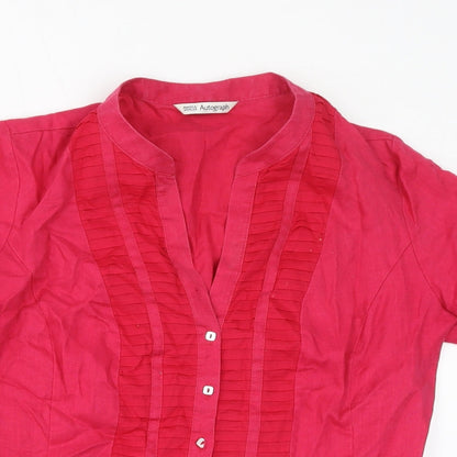 Close-up detail of Autograph women’s pink linen basic button-up, size UK 14, v-neck