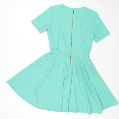 Back view of ASOS women’s green polyester fit & flare, size UK 8, round neck pullover