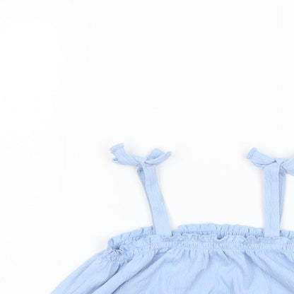 Close-up detail of H&M girls’ blue polyester basic blouse, size 3-4, years square neck pullover