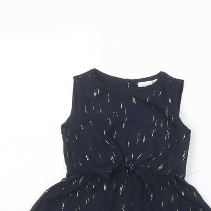 Close-up detail of NAME IT girls’ black geometric polyester basic blouse, size 2, years round neck button