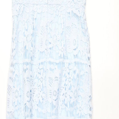 Brand and care label for Missguided women’s blue polyester mermaid, size UK 8, round neck zip