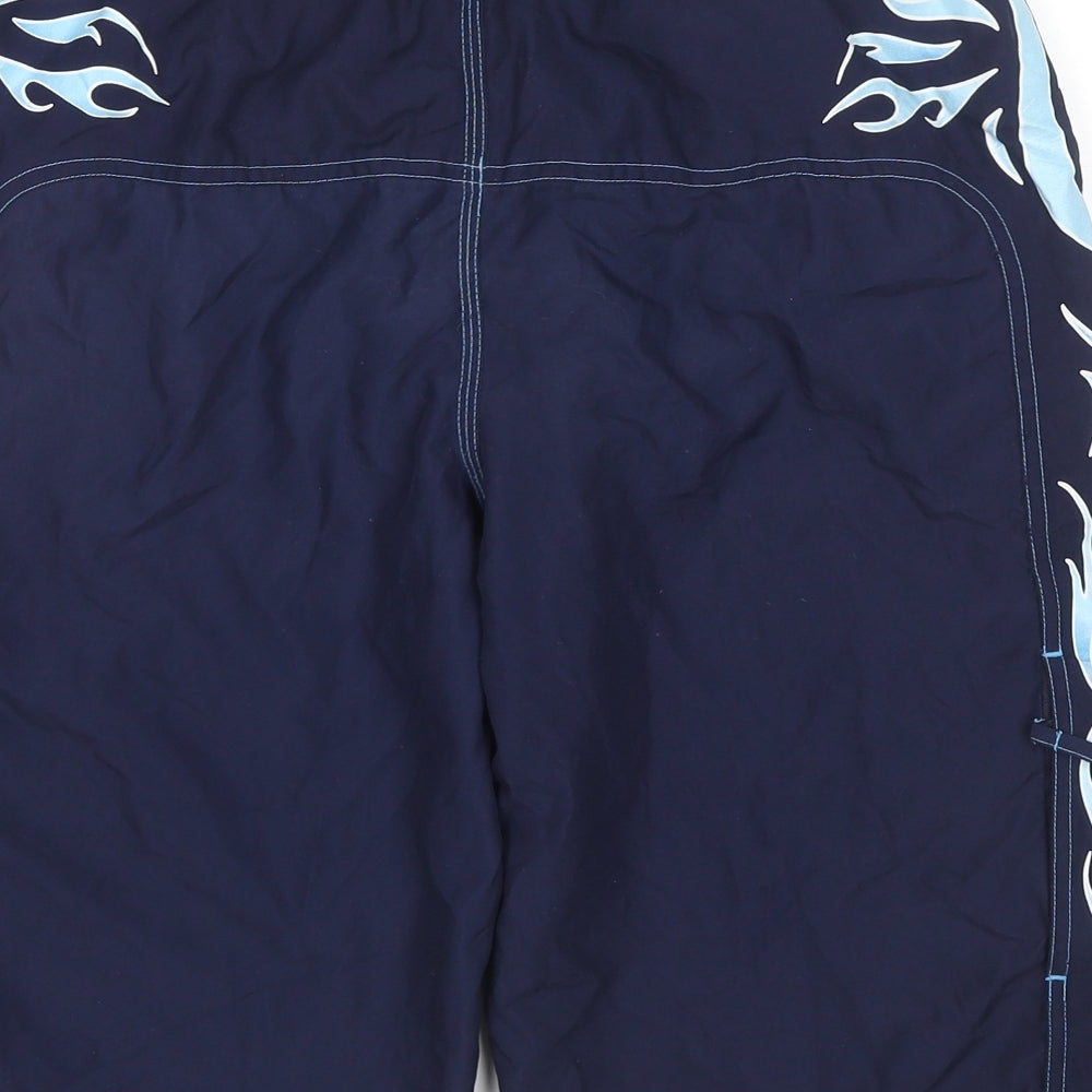 Brand and care label for Speedo boys’ blue polyester utility shorts