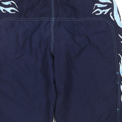 Brand and care label for Speedo boys’ blue polyester utility shorts