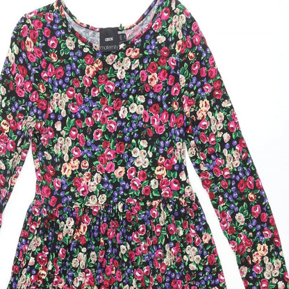 Close-up detail of ASOS women’s multicoloured floral viscose a-line, size UK 8, roll neck pullover