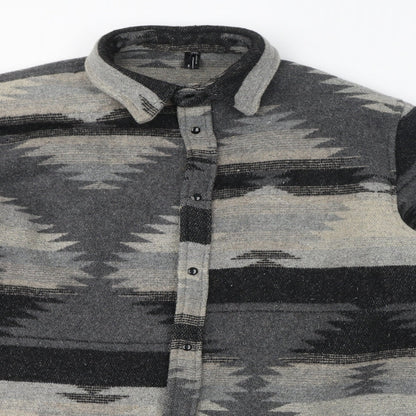 Close-up detail of Fashion women’s grey geometric jacket, size 3XL, button