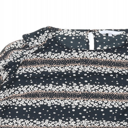 Close-up detail of Red Herring women’s black floral polyester basic t-shirt, size UK 10, round neck - cold shoulder