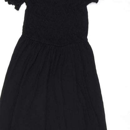Close-up detail of ASOS women’s black viscose a-line, size UK 8, off the shoulder pullover