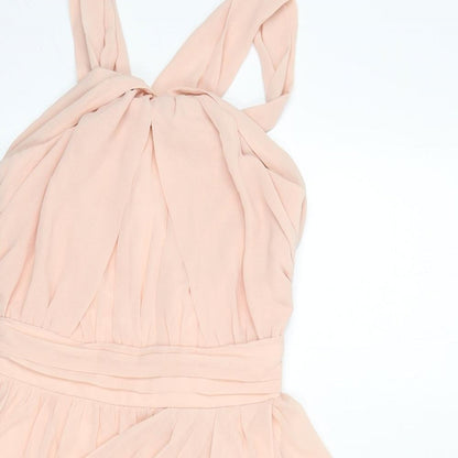 Close-up detail of ASOS women’s pink polyester mini, size UK 8, halter zip