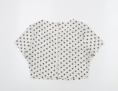 Back view of Missguided women’s white polka dot polyester cropped blouse, size UK 8, round neck