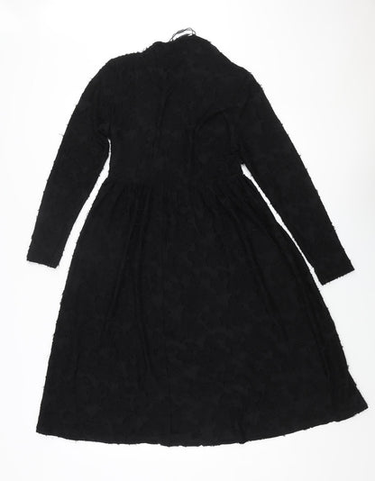 Back view of JDY women’s black polyester a-line, size S, round neck pullover - textured