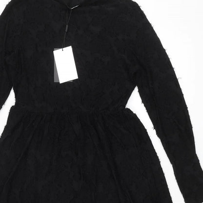 Close-up detail of JDY women’s black polyester a-line, size S, round neck pullover - textured