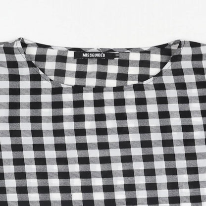Close-up detail of Missguided women’s black check polyester basic blouse, size UK 10, round neck