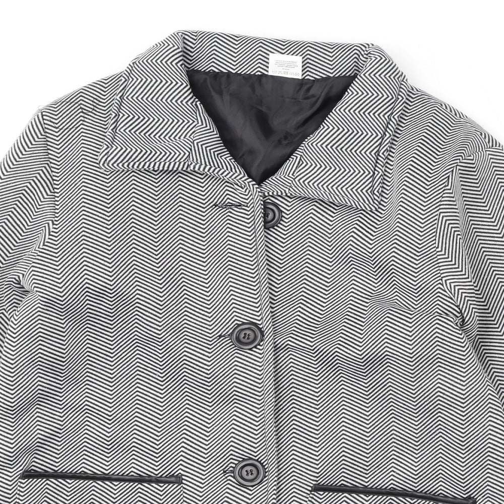 Close-up detail of Anne De Lancay women’s black geometric jacket, size UK 12, button