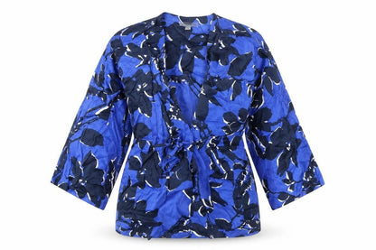 Front view of Autograph women’s blue geometric viscose wrap blouse, size M, v-neck