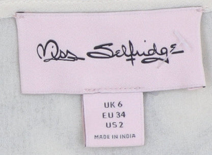 Close-up detail of Miss Selfridge Women Ivory Cold Shoulder Blouse