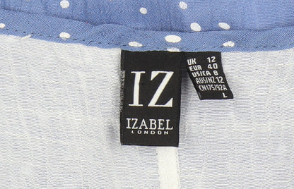 Close-up detail of Izabel London Blue Polka Dot Blouse, size 12, Sleeveless