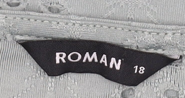 Close-up detail of Roman Women's Green Puff Sleeve Blouse, size 18