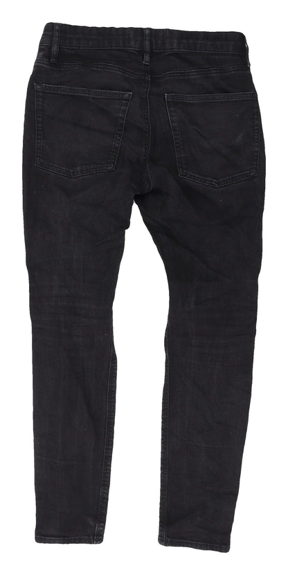 Back view of Easy Men's Black Skinny Jeans, size 30, Flame-Resistant