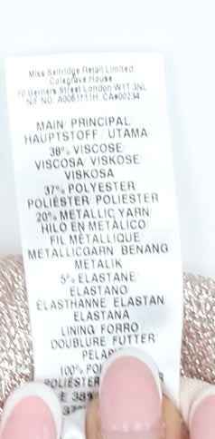 Brand and care label for Miss Selfridge Women's Silver Cropped Blouse UK 12