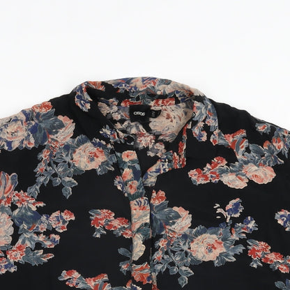 Close-up detail of ASOS women’s black floral viscose basic button-up, size UK 6, collared