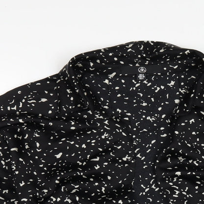 Close-up detail of Missguided women’s black geometric polyester basic blouse, size UK 8, collared