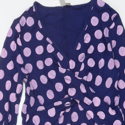 Close-up detail of ASOS women’s purple polka dot viscose a-line, size UK 8, v-neck pullover
